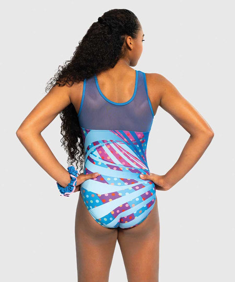 Girls gymnastics leotard with sleek blue front and pink-purple balloon print back. Asymmetrical mesh detail