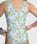 Close-up of blue stripe detail and berry floral print on Berry Bliss gymnastics leotard.