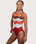 Plum Fawn Keyhole Gymnastics Leotard for Girls in orange, copper, brown, and white. Girls Gymnastics Leotard with wavy design.