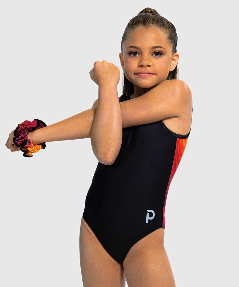 Girls gymnastics leotard with sleek black front and fiery orange-to-yellow ombré back. Flip Side design.