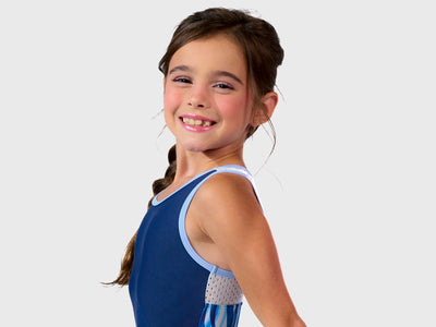 The Plum Cares Frozen Waves Racerback Leotard with vibrant blue wave patterns and white accent racerback inspired by the Arctic Ocean.   