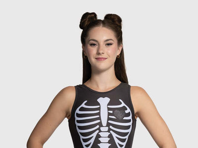 Front view - girls gymnastics leotard, black with white ribcage, crystal heart accent, traditional tank