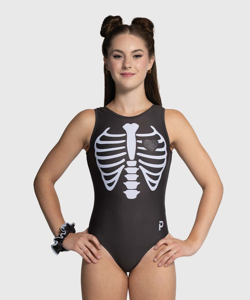 Front view - girls gymnastics leotard, black with white ribcage, crystal heart accent, traditional tank