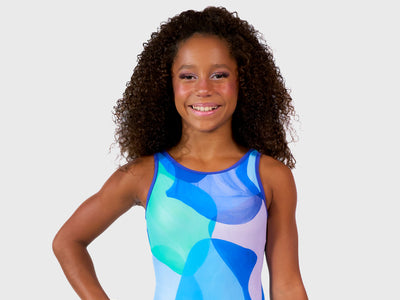 Plum Iceberg Illusion Keyhole Leotard in blue and green tones with keyhole back, designed for young gymnasts. Includes smooth seams and matching scrunchie. 