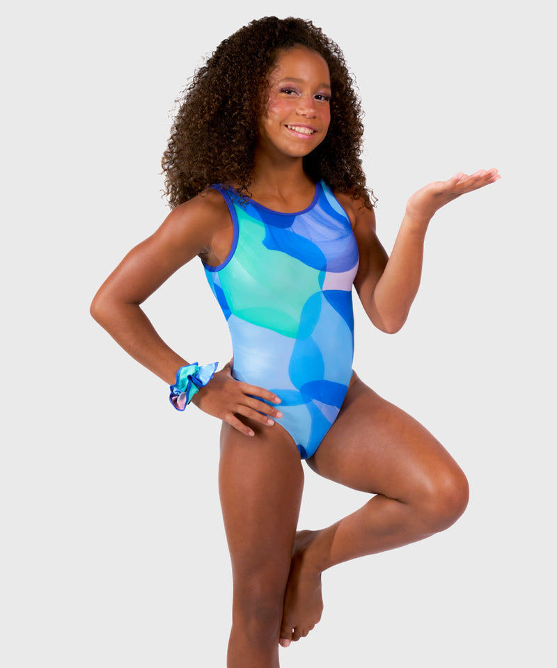 Plum Iceberg Illusion Keyhole Leotard in blue and green tones with keyhole back, designed for young gymnasts. Includes smooth seams and matching scrunchie. 