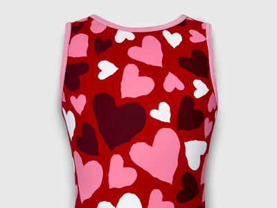 Front of Forever Yours leotard featuring a bold red base, pink and white hearts, and a stylish v-waistband.