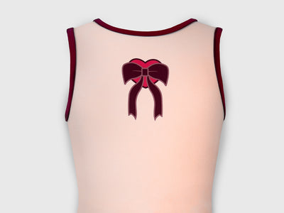 Front of Bow-tiful Valentine leotard with pink and maroon bow and heart pattern for a fun Valentine look.