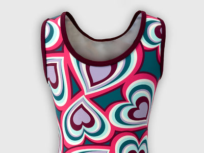 Back of Sweetheart Chic leotard with vibrant heart accents and solid teal base.