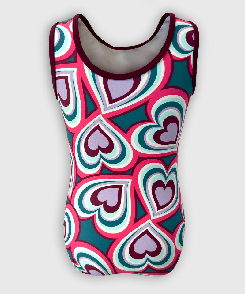 Back of Sweetheart Chic leotard with vibrant heart accents and solid teal base.