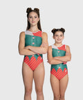 Women and girls gymnastics leotard with candy cane stripe body, green vest overlay, and sheer mesh cutouts.