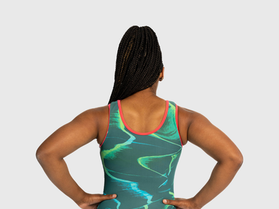 Girls leotard with matte teal front and hues of sea-green back. Flip Side silhouette for gymnasts.