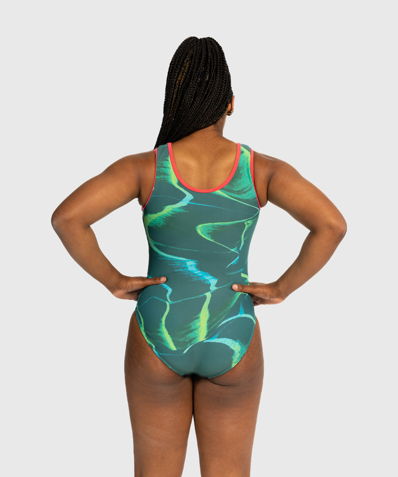 Girls leotard with matte teal front and hues of sea-green back. Flip Side silhouette for gymnasts.
