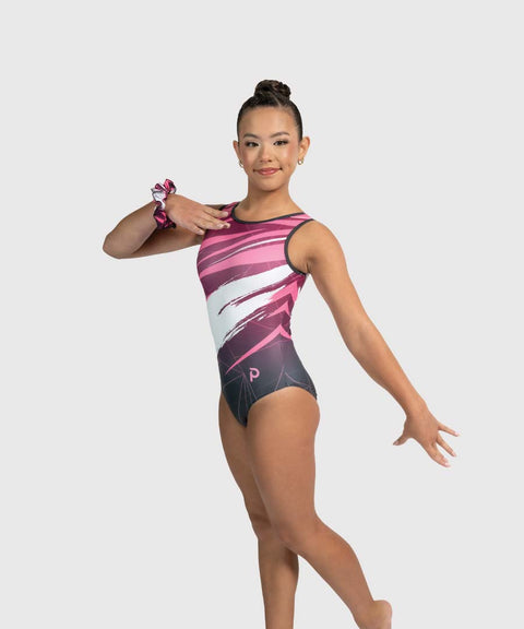 Gymnast modeling the Plum Hyper Drive traditional tank gymnastics leotard in a side pose