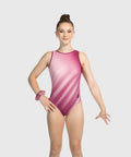 Gymnast wearing the Plum Pixel Rush pink and berry traditional tank gymnastics leotard, front view