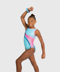 Gymnast posing in the Plum Synch Wave aqua and pink tank gymnastics leotard