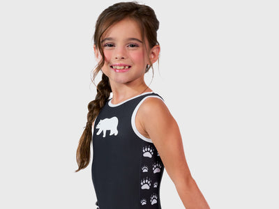 Plum Cares Snow Bear Boogie Traditional Leotard in black and white, with paw print accents.   