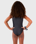 Plum Cares Waddle Wuv Traditional Leotard is with black, silver, and white tones, featuring penguin feather-inspired patterns. 