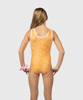 A girl modeling a one-piece leotard from the back, showing a textured golden-yellow surface with white trim, set against a solid light gray background.