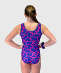 Gymnast wearing Plum's Hearts in Motion collection