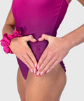 Plum's glitter heart valentine gymnastic leotard for girls.